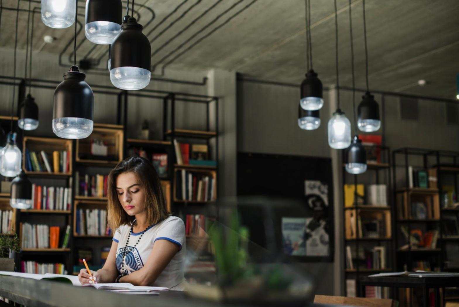 Business professional reviewing financial documents and budget planning materials